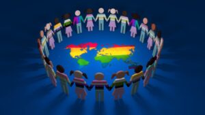 Group of cutout LGBTQ people holding hands together